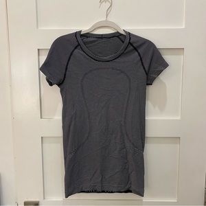 Lululemon black and white stripped tight fit workout top